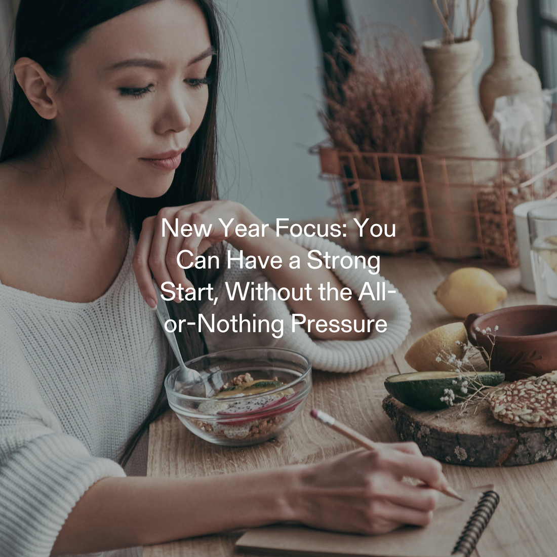Woman enjoying a mindful breakfast while journaling healthy habits, embracing a balanced New Year start with support from Calocurb and natural GLP-1 boosters