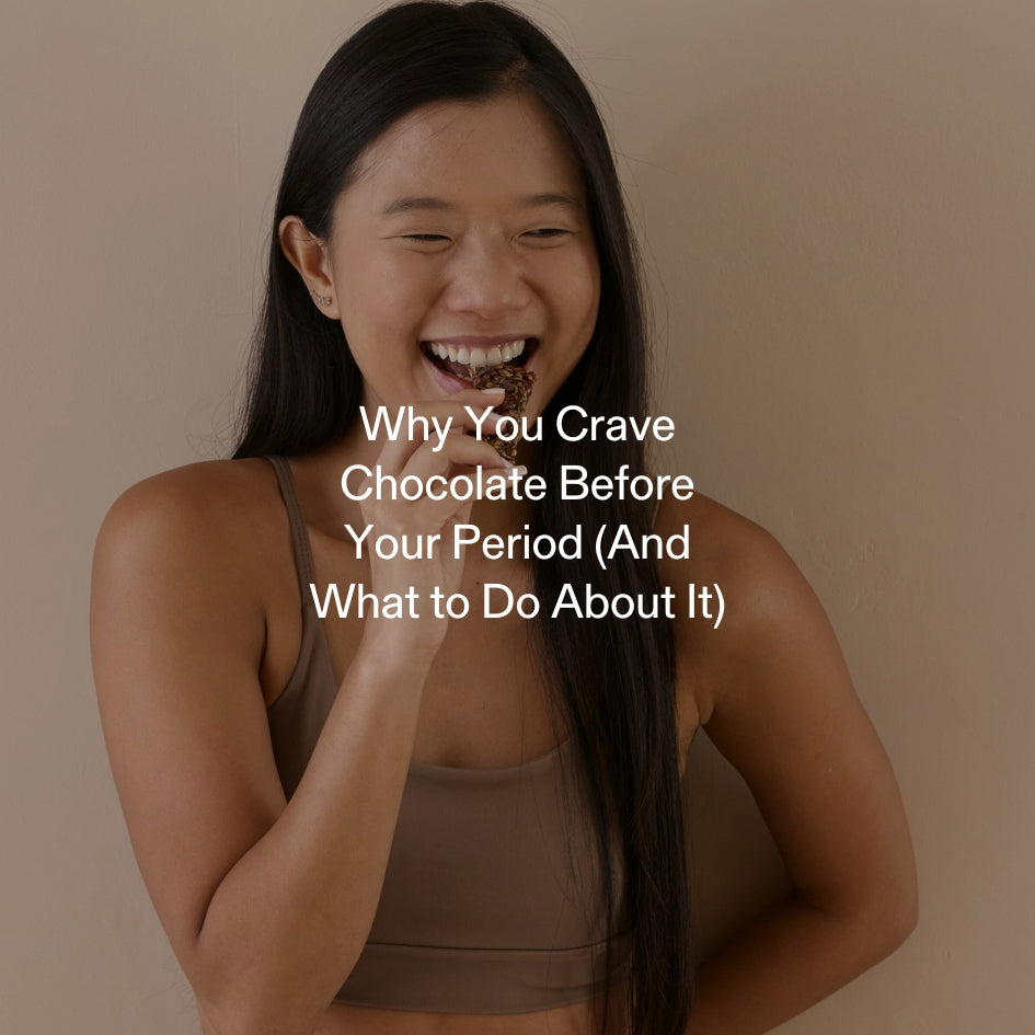 Woman eating chocolate to satisfy premenstrual craving